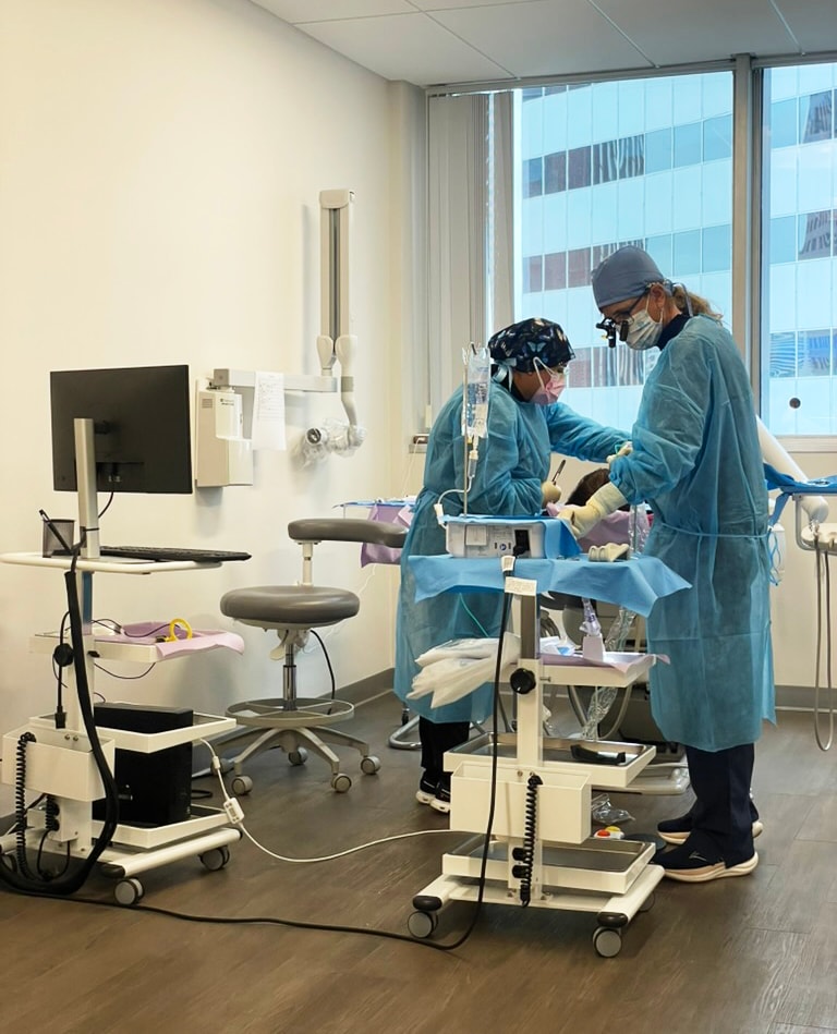 Dr. Golden and team performing periodontal surgery